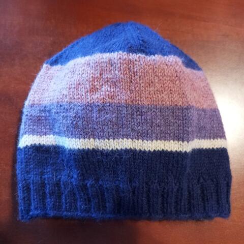 Warm soft hand knitted beanie to keep you warm during winter days